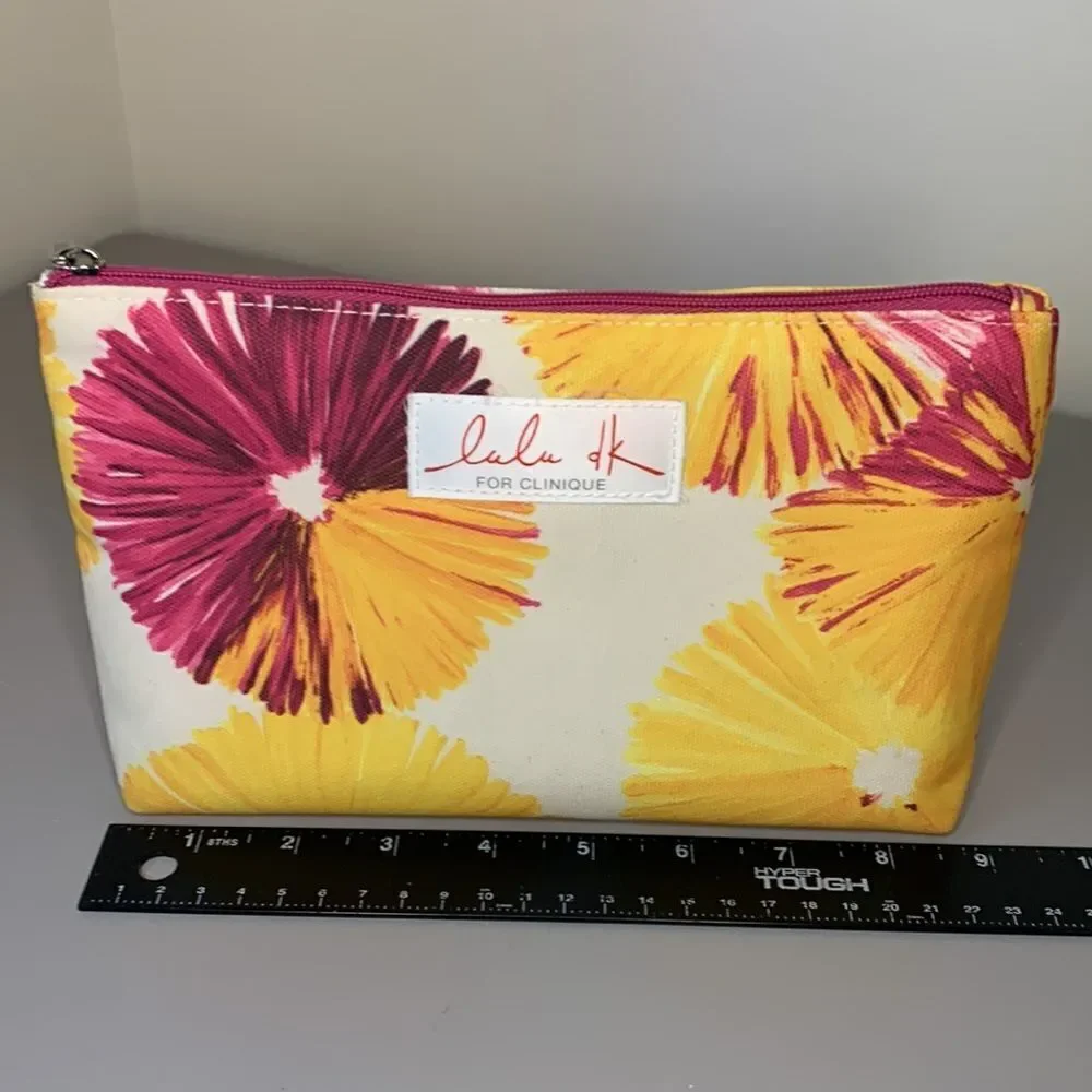 EUC Clinique LaLa DK makeup bag